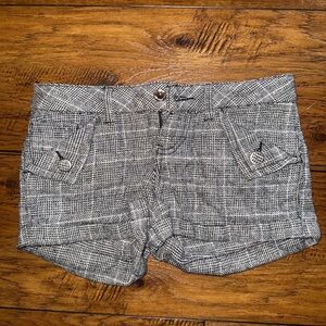 Women's Black and White Shorts with rhinestone button.Soft material Never worn.